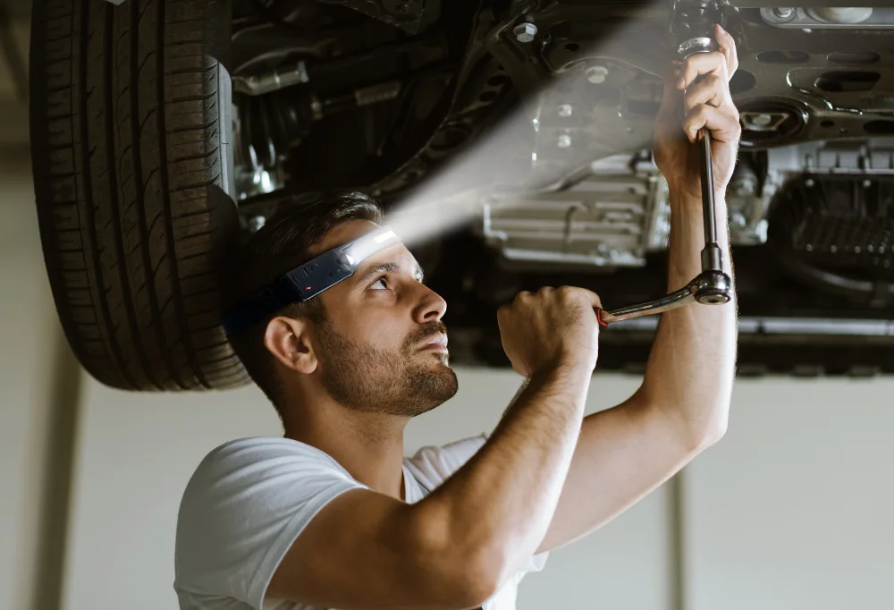 Photo of someone using headlamps while working.