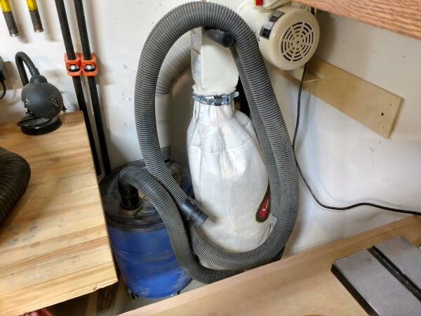 Dust collector tucked away in the corner of my wood shop